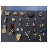 26 brooches