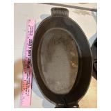 Elongated cast-iron pan