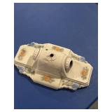 Vtg porcelain light fixture has a chip