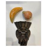 Cherub wall pocket and marble fruit