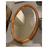 Small wooden oval mirror