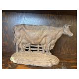 Cast iron cow door stop