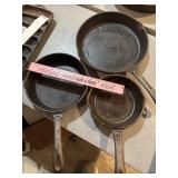 3 cast iron skillets