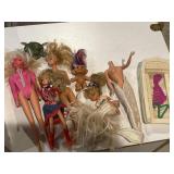 Barbies and troll doll