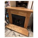 Oak electric fireplace. Works