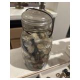 Atlas jar full of buttons