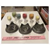 Small candles and pet candle holders