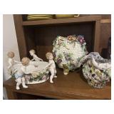 Antique dish with cherubs, etc., some losses