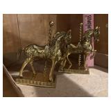 Brass carousel horses
