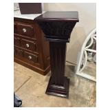 Wooden pedestal