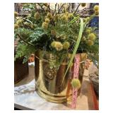 Brass planter with floral stems