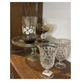 Glass cake stand and glasses, including Fostoria