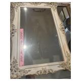 heavy ornate mirror