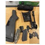Black Mossberg gun stock, other accessories