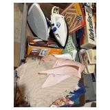 3 irons, box of fabric pieces
