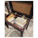 Piano bench seat with contents