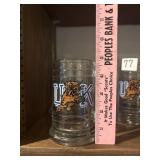 Four glass UK wildcat coffee/stein mugs
