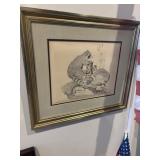 Drawing of raccoon family framed