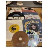 mix of vintage music media, 7ï¿½ vinyl records and