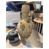 Rustic terra-cotta vase and handmade studio