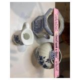 three blue and white vintage ceramic and