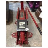 Big red rolling floor jack