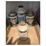 3 12 ounce R12 Freon refrigerant and 1 R22