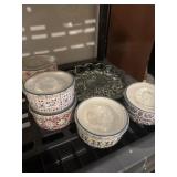 Glass egg plate and six covered glass bowls