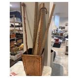 Copper clad trashcan, two canes/walking stick, 7