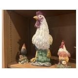 Three decorative roosters various sizes