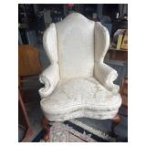 Oversized queen Anne style wingback chair,