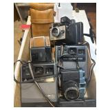 Six Vintage cameras and Ricoh flash Kodak,
