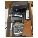 Five vintage cameras, two cases, Polaroid Kodak,
