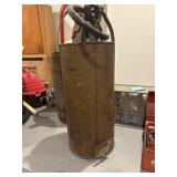 Vintage brass or copper hand pump, water fire
