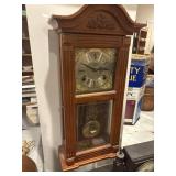 Working wall clock with key, appears to be D+ A