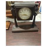 Working antique wooden pedestal mantle clock