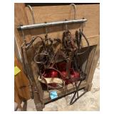 Metal hanger with 6 horse reins