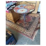 Vibrant round accent table with mosaic tile top