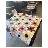 44ï¿½ x 72ï¿½ hand sewn quilt with six point star