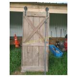 Heavy barn door with track & roller bring help to