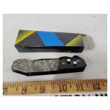 Push button knife