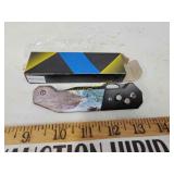 New push button knife