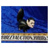 Unusual cast iron skunk with a Hitler face?