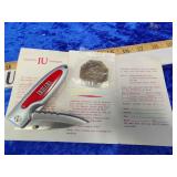 IU token and knife lot