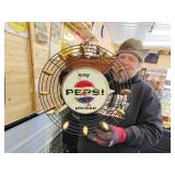 1950s Pepsi clock works but runs backwards