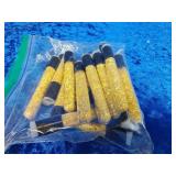 25 vials of gold flakes