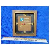 Meridian Insurance clock advertising