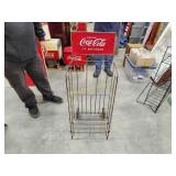 Antique drink Coca-Cola bottles store rack