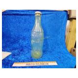 Large Coca-Cola plastic Bank does have cracks