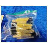 25 vials of gold flakes